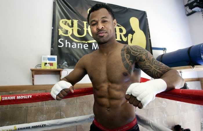 Shane Mosley posing in the gym